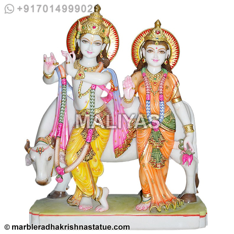 Radha krishna statue with cow